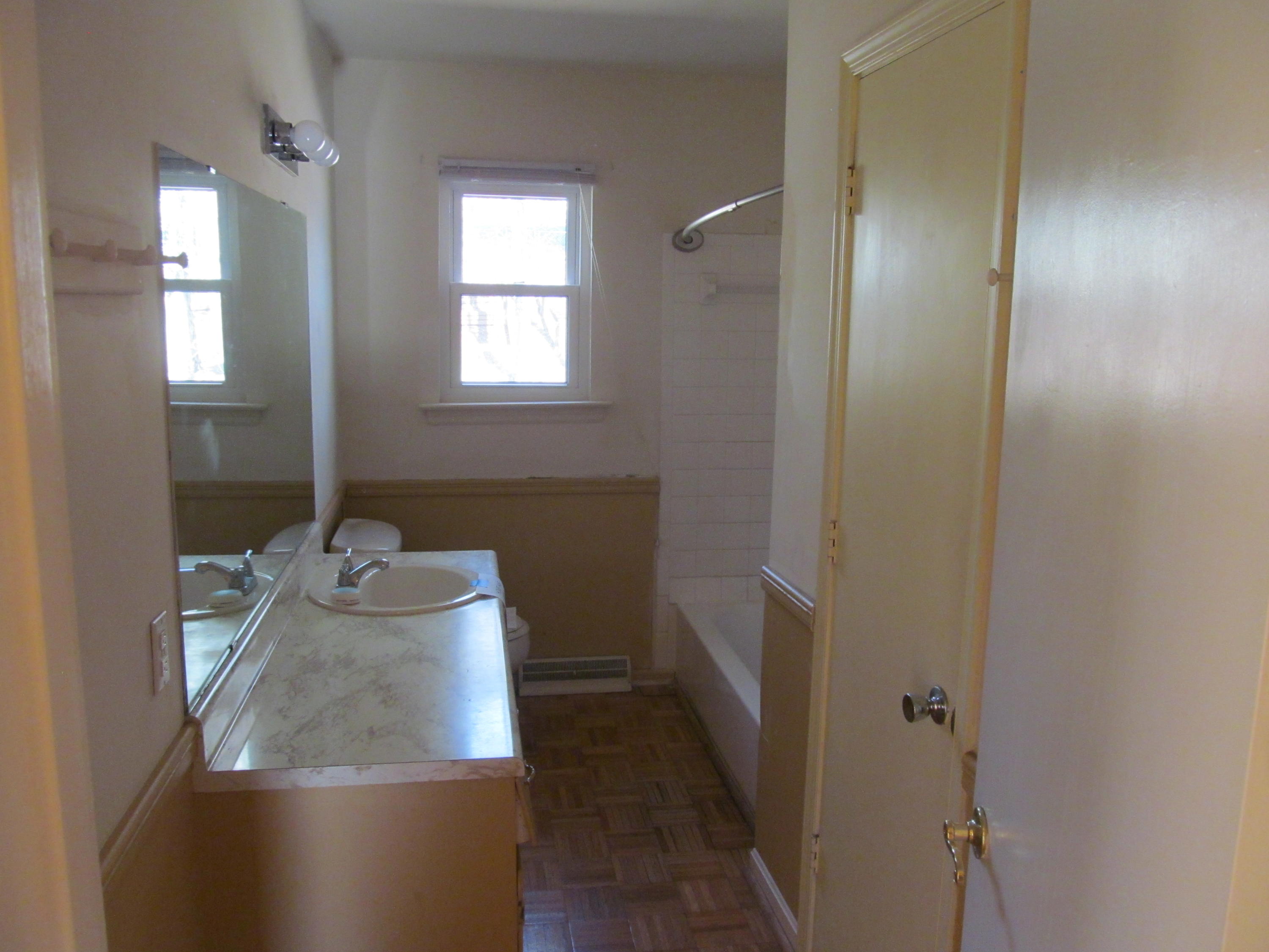 624 Ramada Road Vinton, VA 24179 - Photo 7 of 25 a bathroom with a sink and a mirror