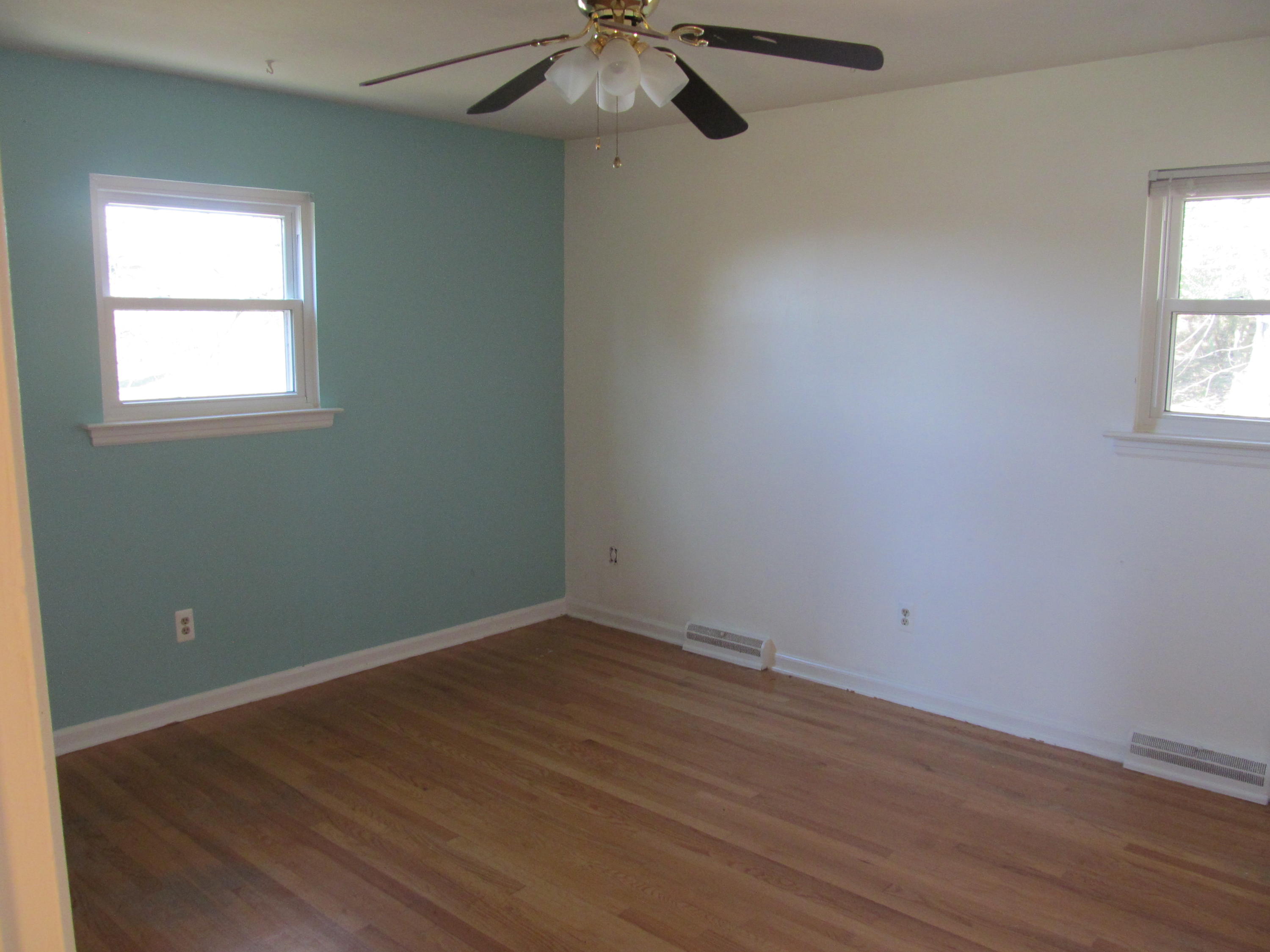 624 Ramada Road Vinton, VA 24179 - Photo 9 of 25 an empty room with a window and a fan