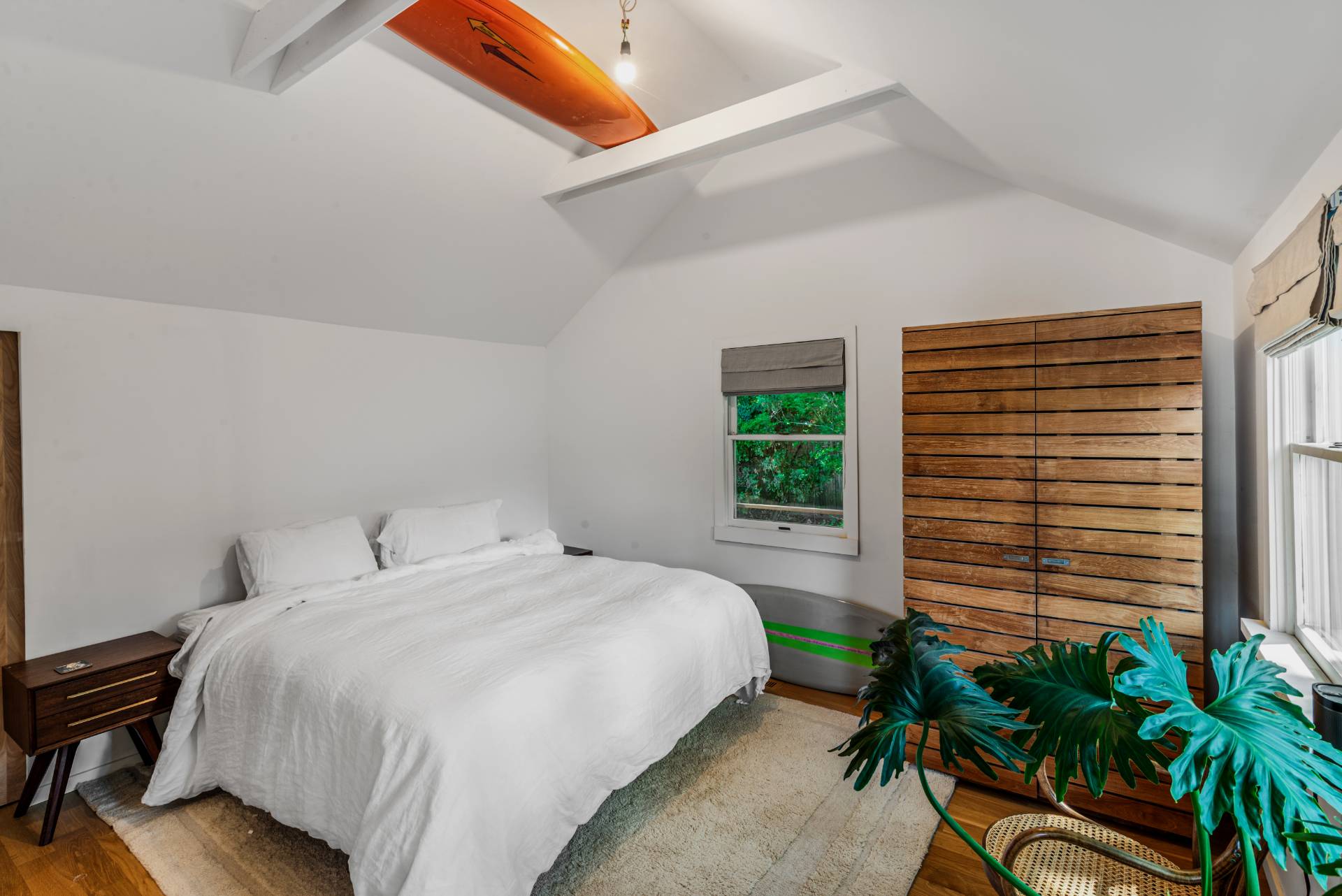 58 Fleming Road Montauk, NY 11954 - Photo 13 of 35 a bedroom with a bed and a window