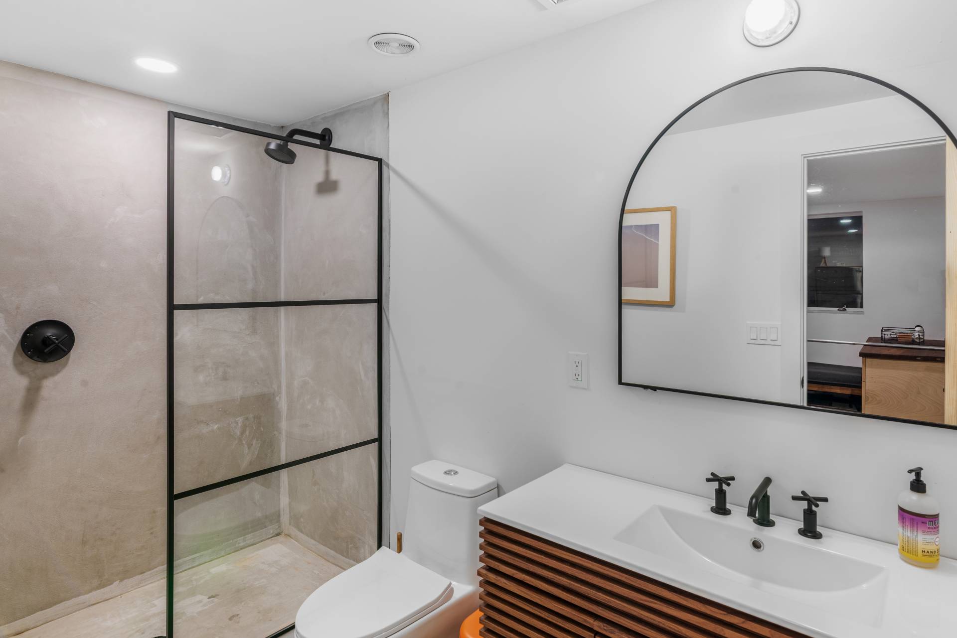 58 Fleming Road Montauk, NY 11954 - Photo 14 of 35 a bathroom with a sink toilet and shower