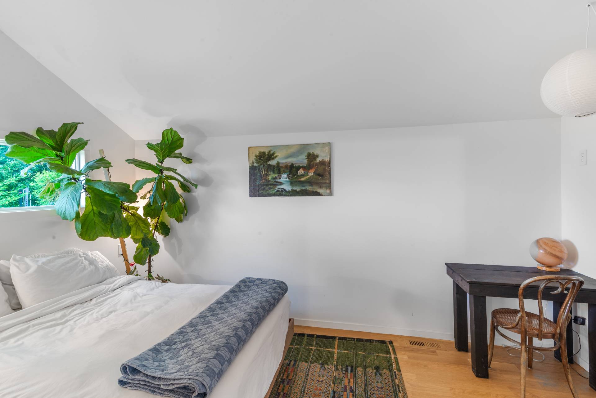 58 Fleming Road Montauk, NY 11954 - Photo 15 of 35 a living room with furniture and a potted plant