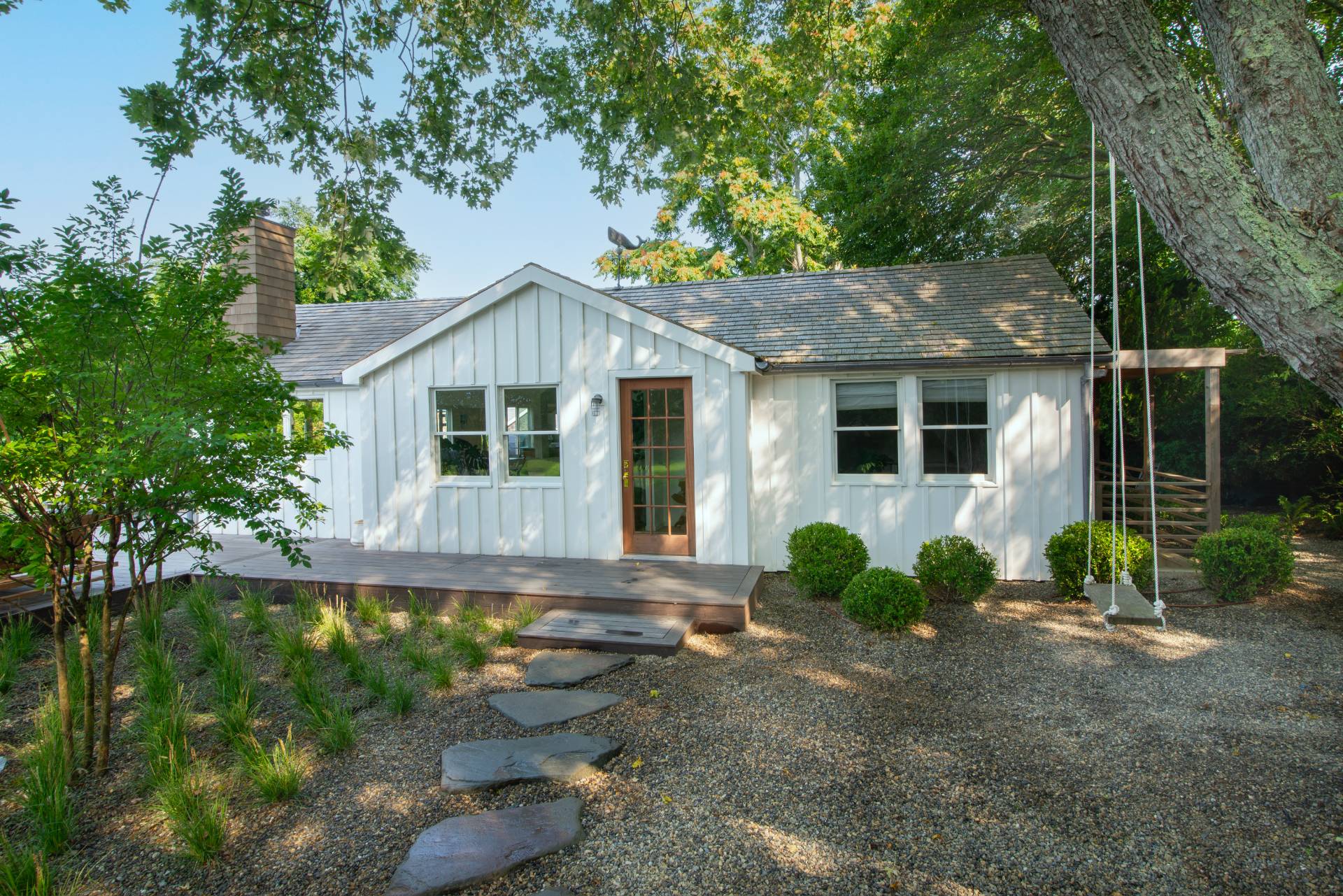 58 Fleming Road Montauk, NY 11954 - Photo 2 of 35 a front view of a house with garden