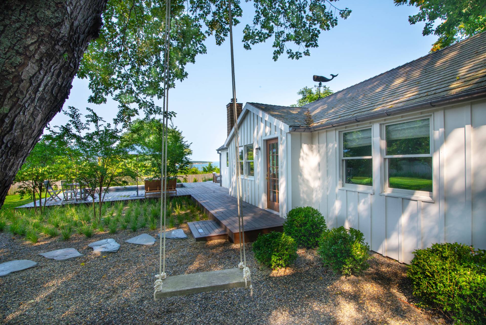 58 Fleming Road Montauk, NY 11954 - Photo 29 of 35 a front view of a house with garden