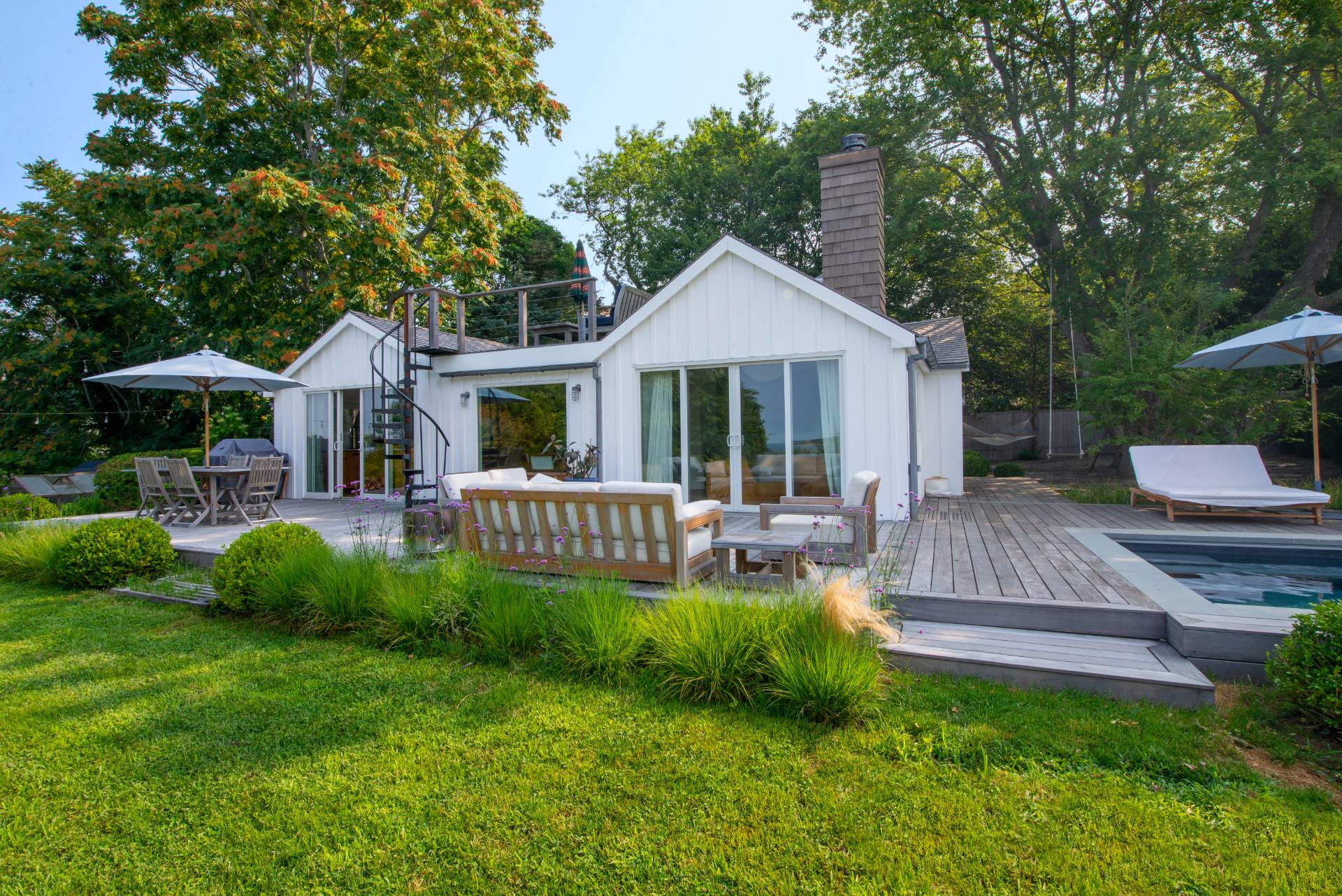 58 Fleming Road Montauk, NY 11954 - Photo 3 of 35 a view of a house with a yard and furniture