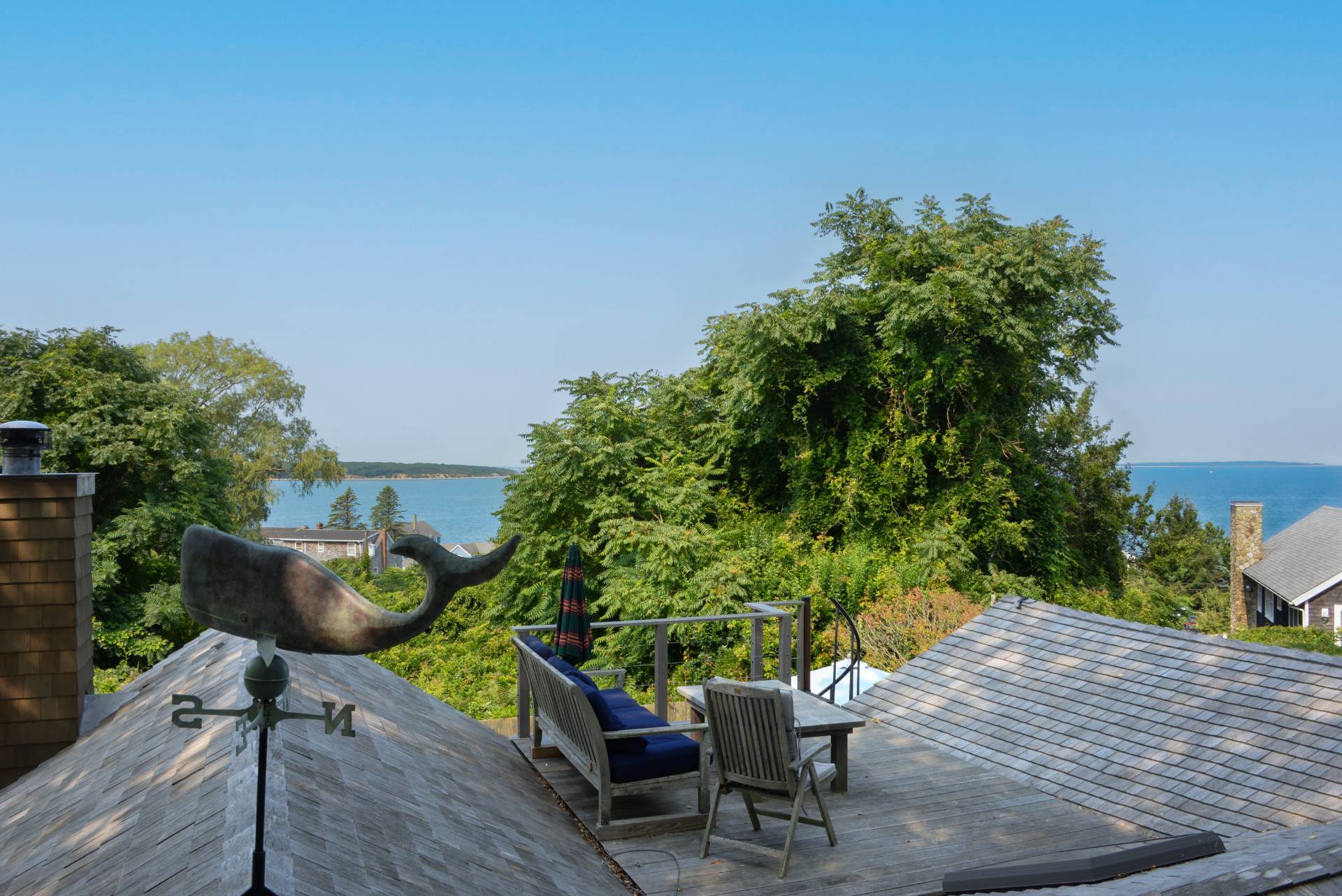 58 Fleming Road Montauk, NY 11954 - Photo 31 of 35 a view of a chair and table in the patio