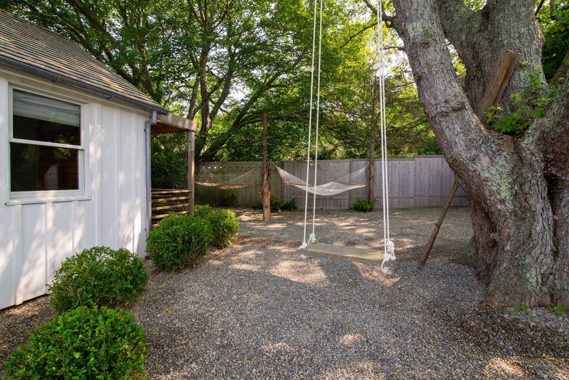 58 Fleming Road Montauk, NY 11954 - Photo 32 of 35 a backyard of a house with lots of green space