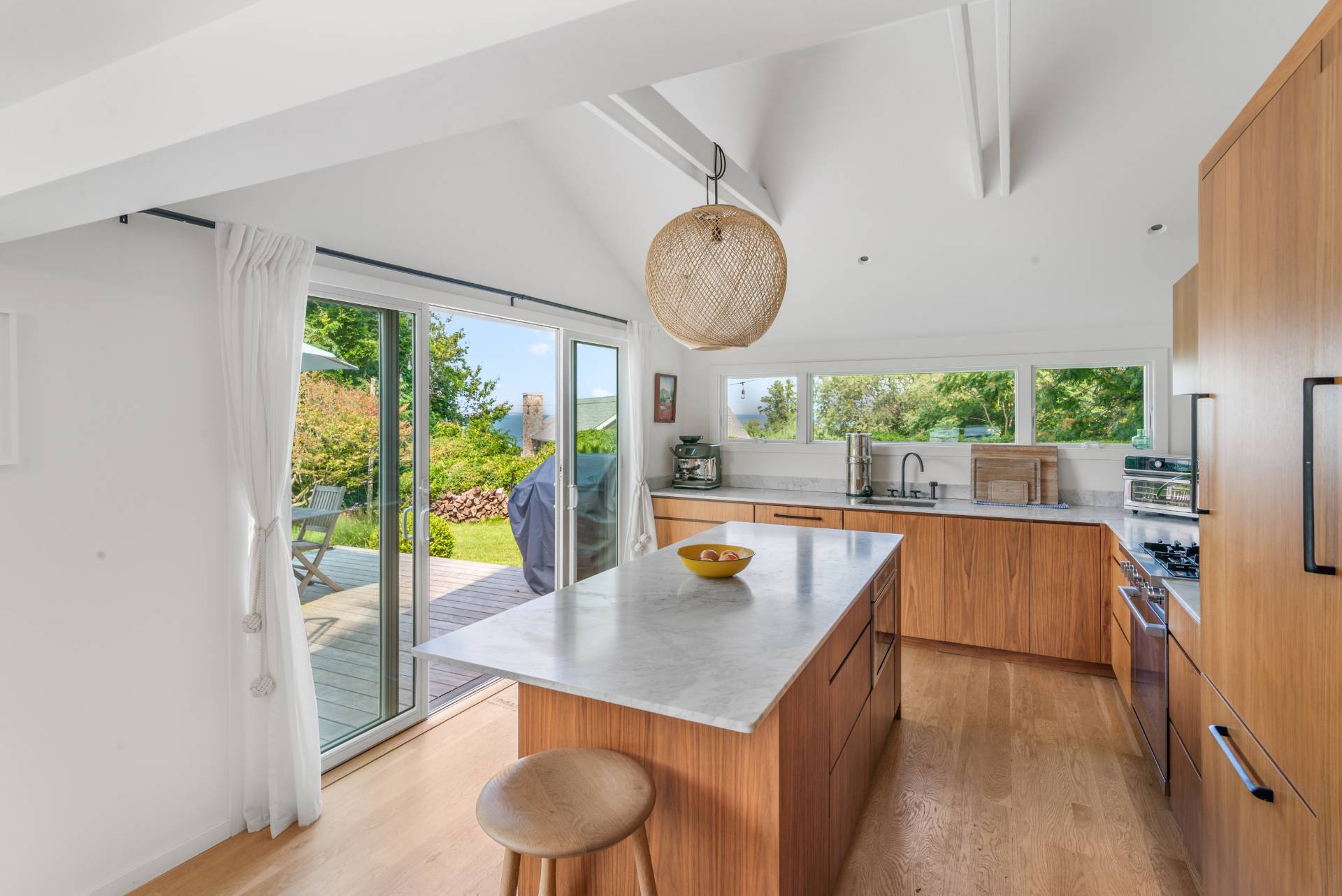 58 Fleming Road Montauk, NY 11954 - Photo 7 of 35 a living room with furniture and a large window