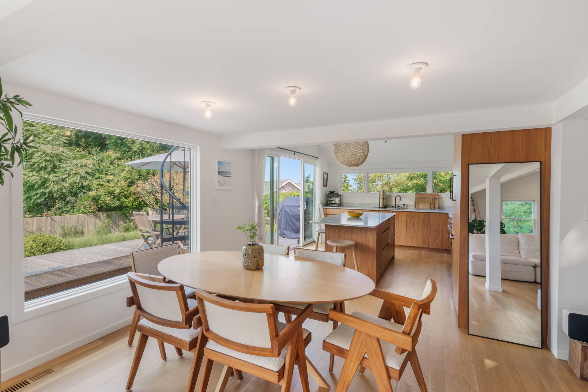 58 Fleming Road Montauk, NY 11954 - Photo 9 of 35 a dining room with furniture window and wooden floor