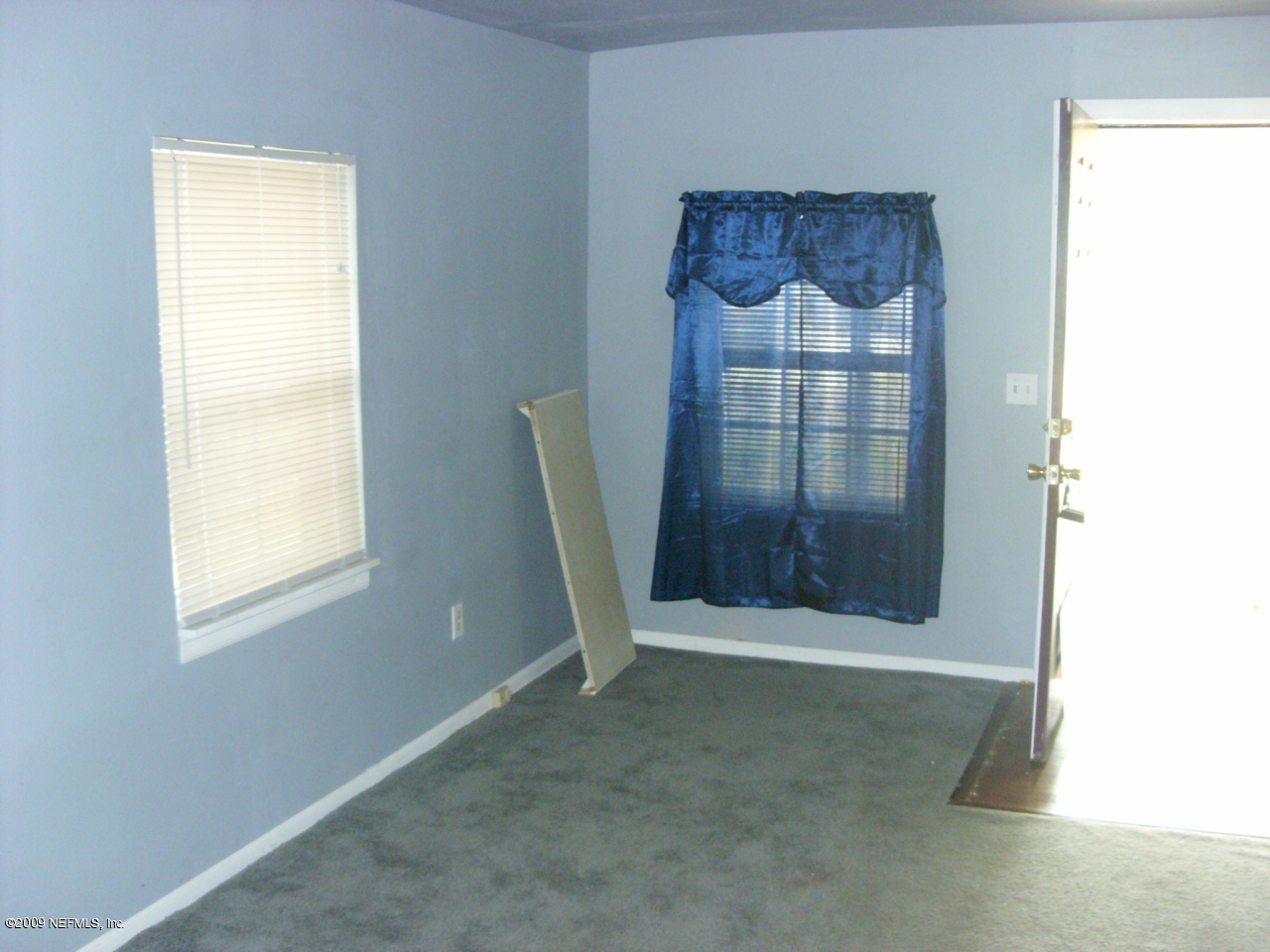 5657 Spellman Road Jacksonville, FL 32209 - Photo 4 of 5 a view of entryway with wooden floor