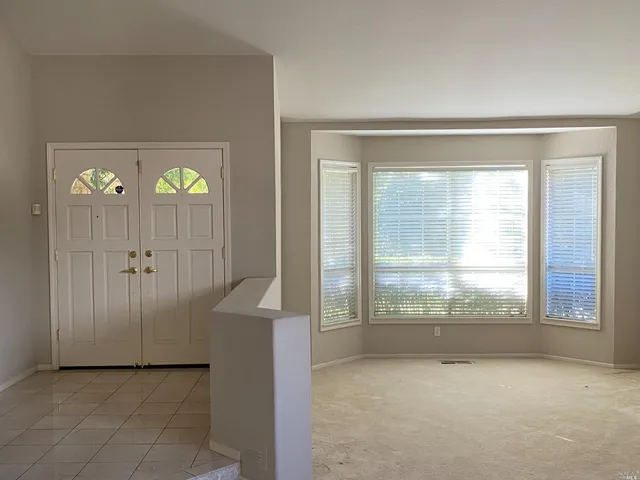 wooden floor and window in a room