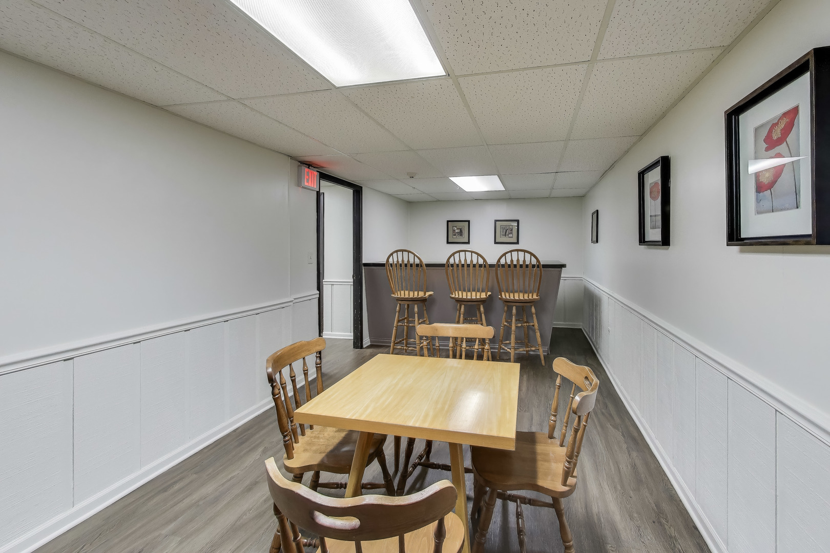 475 Shenstone Road, Unit 104 Riverside, IL 60546 - Photo 22 of 24 a view of a dining room with furniture and wooden floor