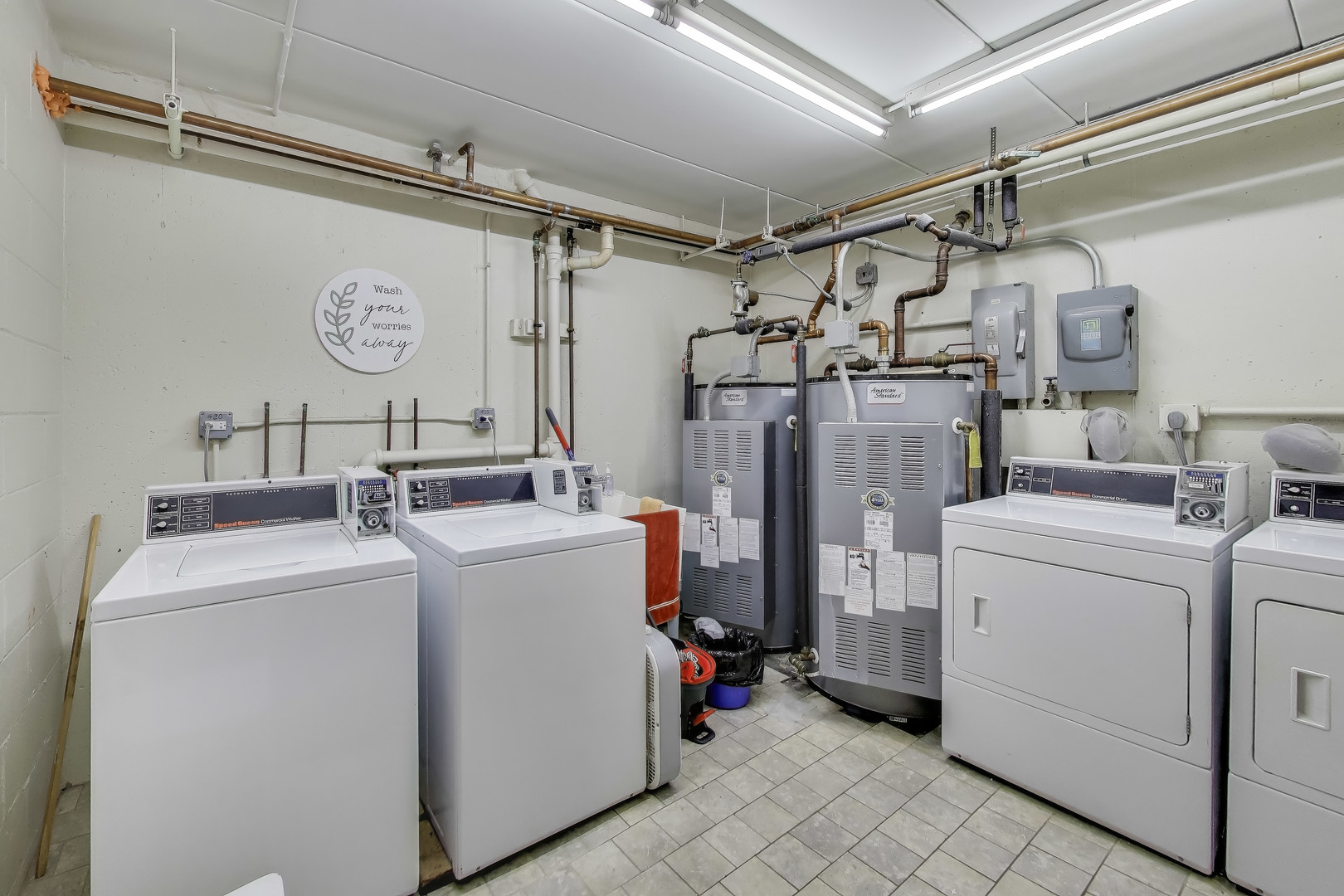 475 Shenstone Road, Unit 104 Riverside, IL 60546 - Photo 23 of 24 a utility room with dryer and washer
