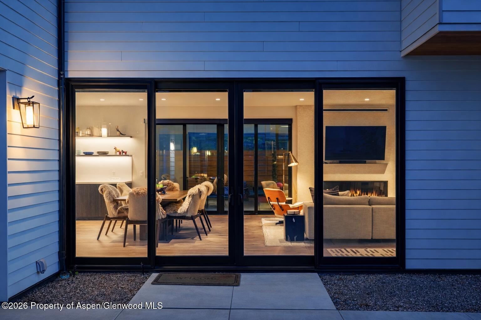 219 Juniper Court Basalt, CO 81621 - Photo 22 of 25 a view of a porch with furniture and floor to ceiling window