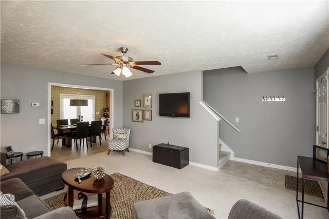 1042 Woodall Road Lebanon, TN 37090 - Photo 4 of 16 a living room with furniture and a flat screen tv
