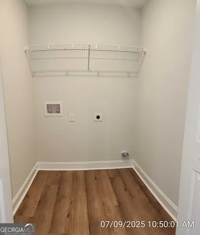 a view of small space with racks on the wall