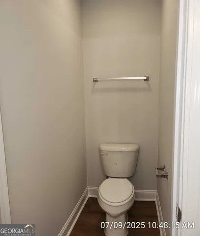 a bathroom with a toilet