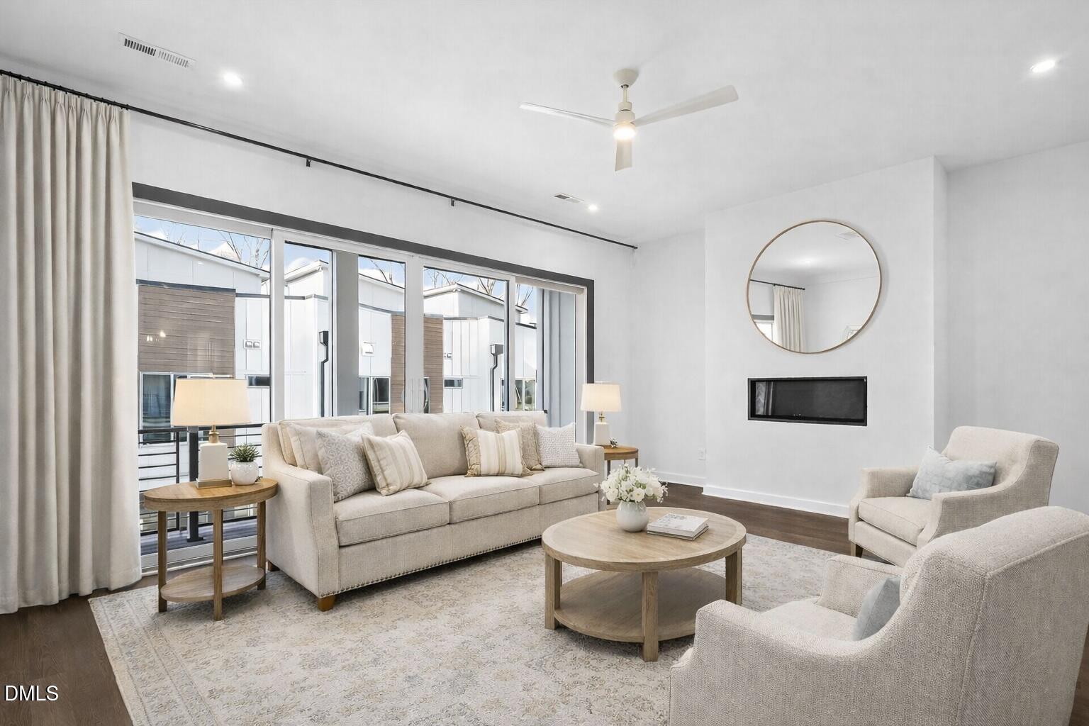1521 1/2 Sunrise Avenue Raleigh, NC 27608 - Photo 11 of 37 a living room with furniture and a large window