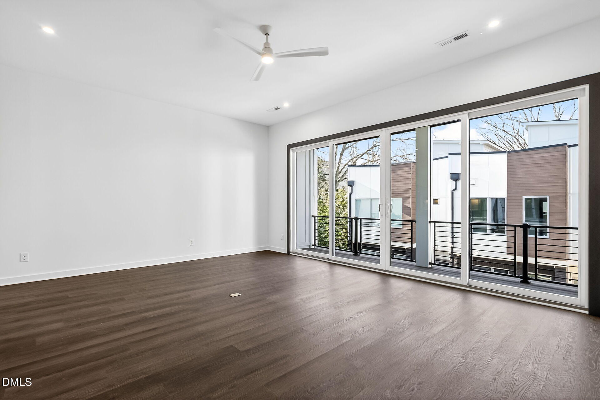 1521 1/2 Sunrise Avenue Raleigh, NC 27608 - Photo 13 of 37 wooden floor in an empty room with a window