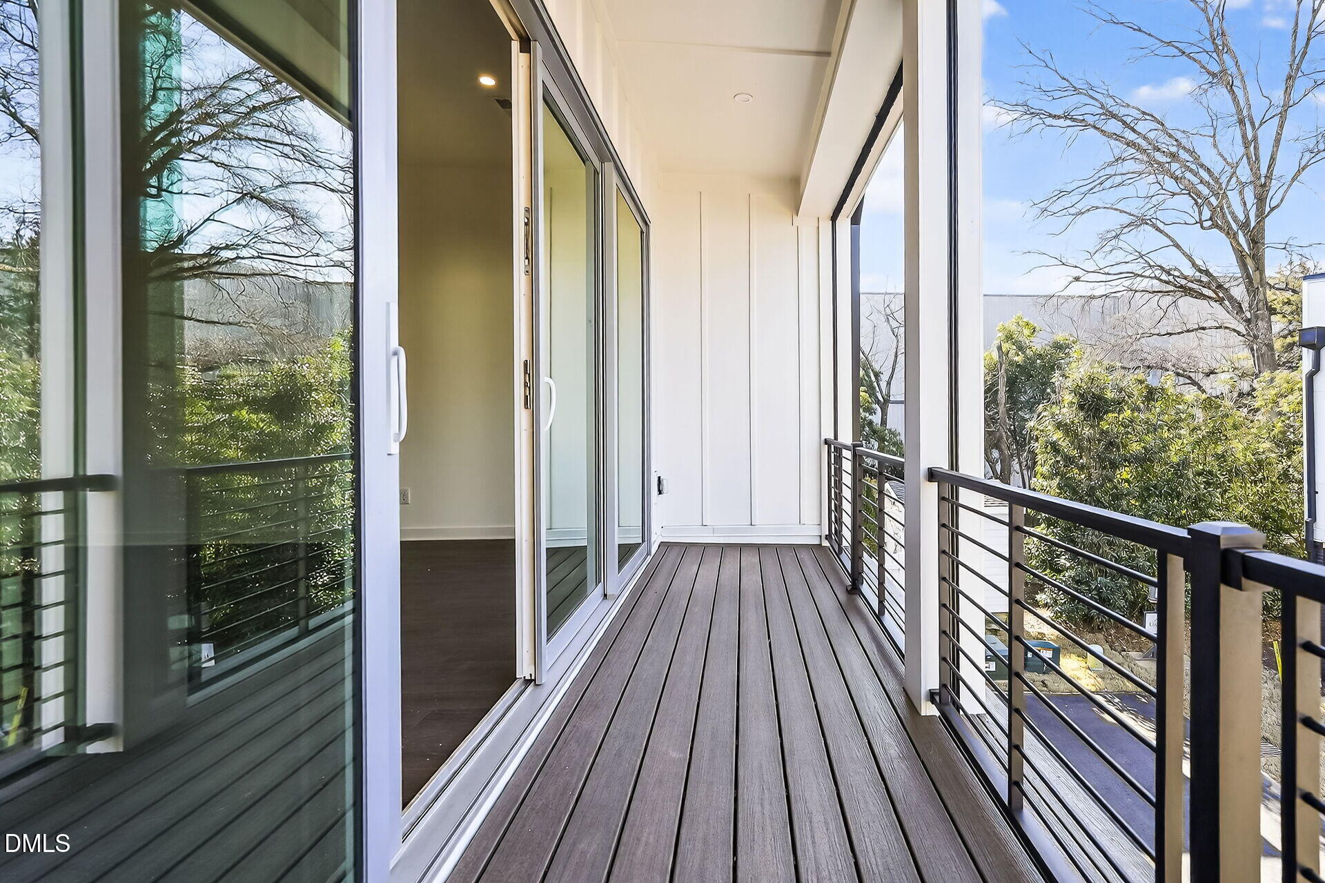 1521 1/2 Sunrise Avenue Raleigh, NC 27608 - Photo 16 of 37 a view of balcony with wooden floor