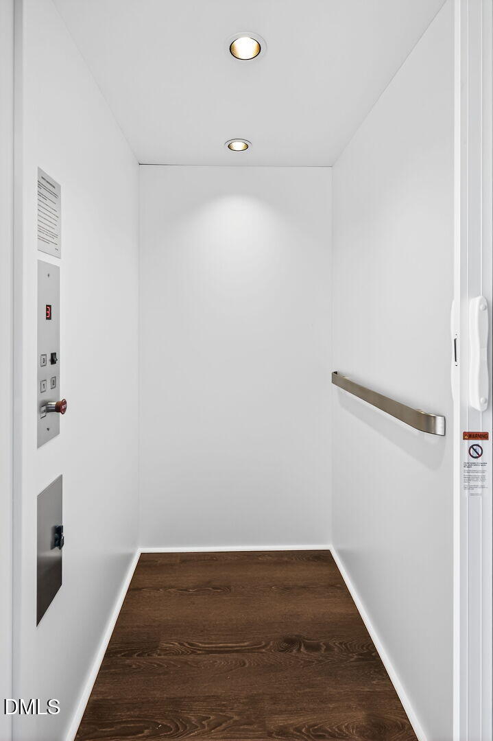 1521 1/2 Sunrise Avenue Raleigh, NC 27608 - Photo 17 of 37 a view of a room with wooden floor