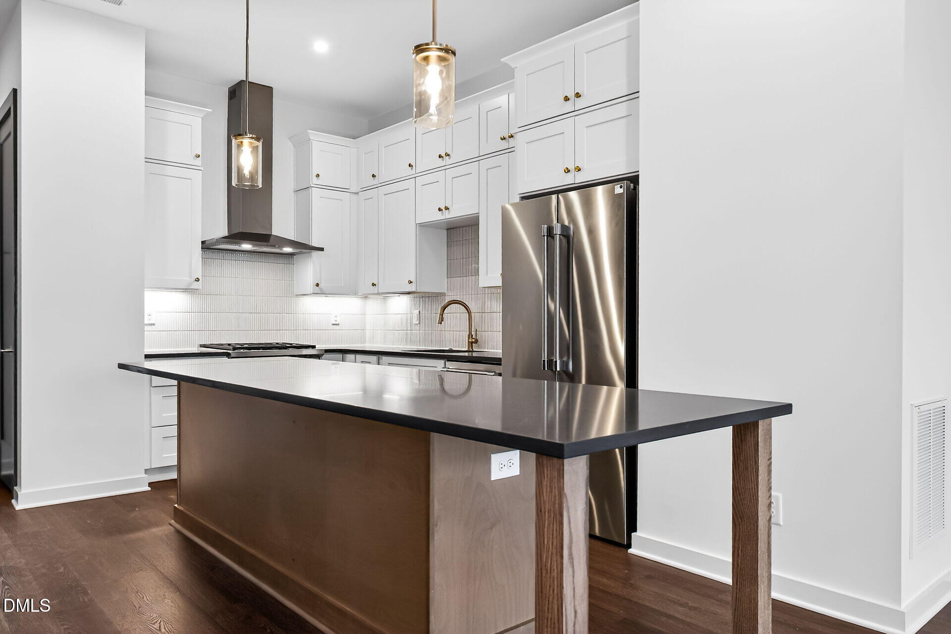 1521 1/2 Sunrise Avenue Raleigh, NC 27608 - Photo 18 of 37 a kitchen with stainless steel appliances granite countertop a refrigerator a sink dishwasher a stove and a refrigerator