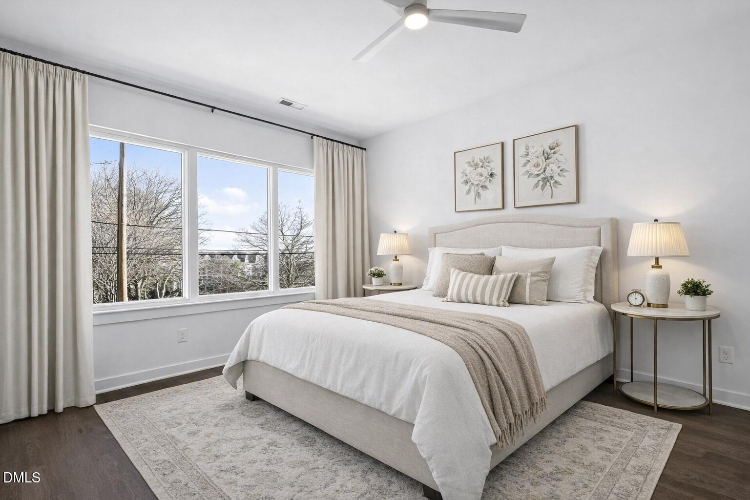 1521 1/2 Sunrise Avenue Raleigh, NC 27608 - Photo 22 of 37 a bedroom with a large bed and a window