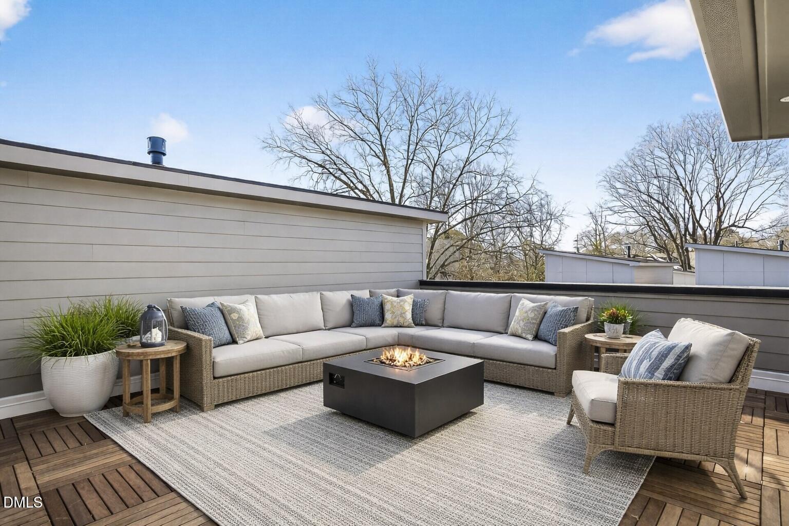 1521 1/2 Sunrise Avenue Raleigh, NC 27608 - Photo 27 of 37 a couch sitting in patio of a house