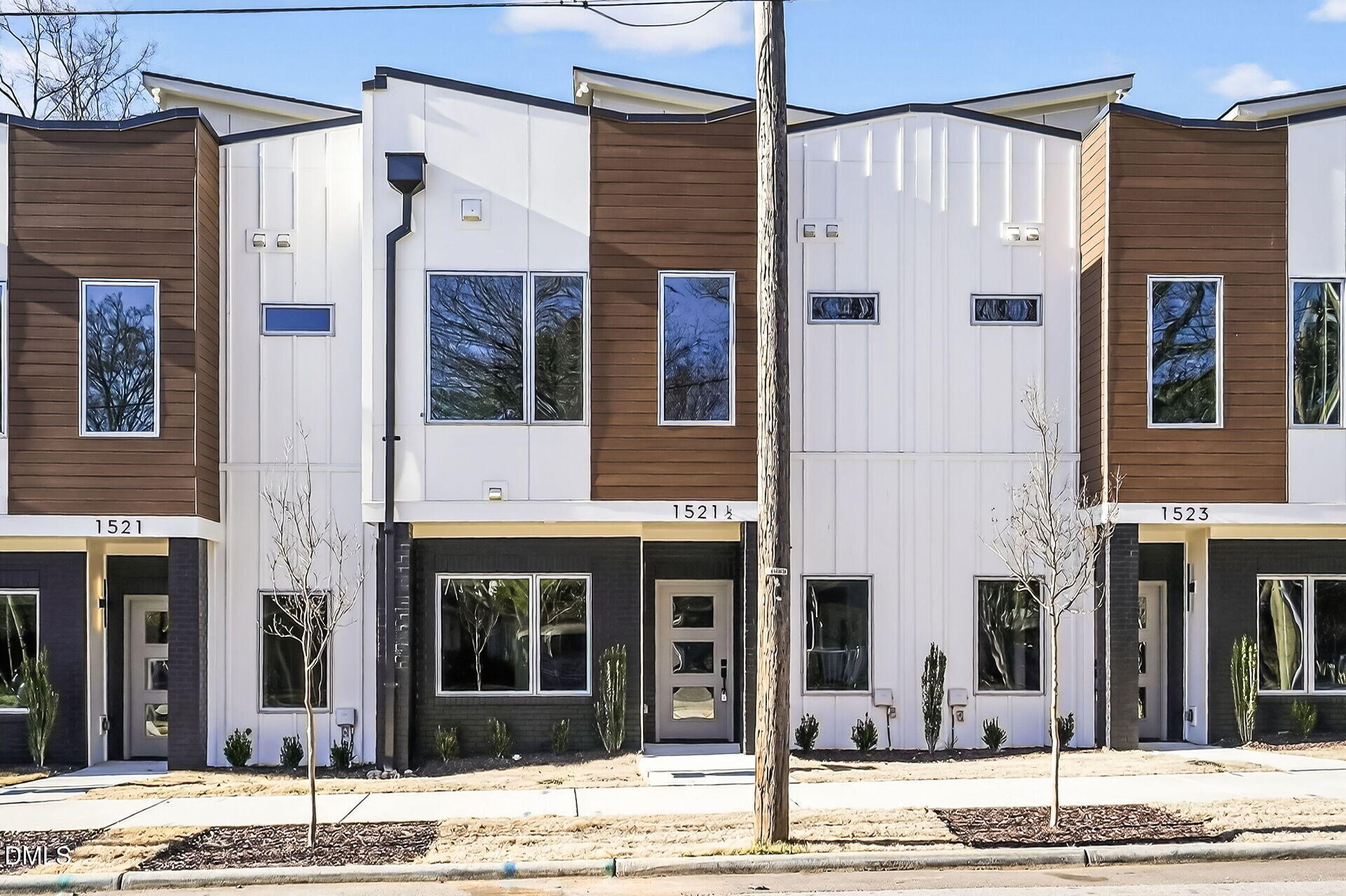 1521 1/2 Sunrise Avenue Raleigh, NC 27608 - Photo 34 of 37 a building that has a sign on it