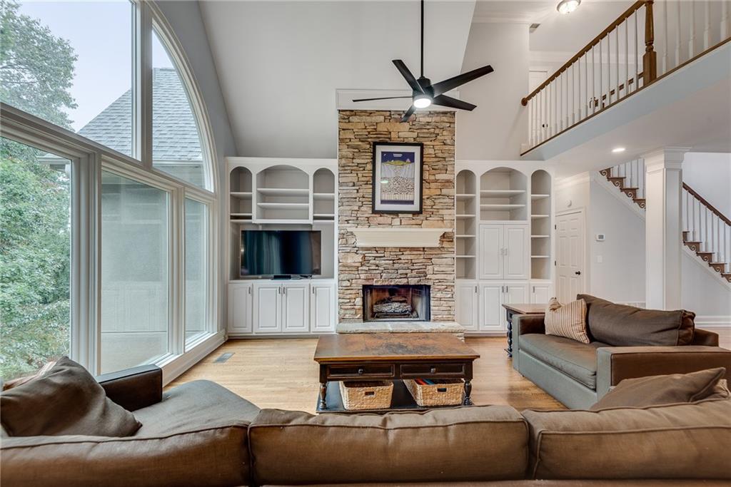 3969 Walkers Ridge Court Dacula, GA 30019 - Photo 17 of 60 a living room with furniture and a fireplace