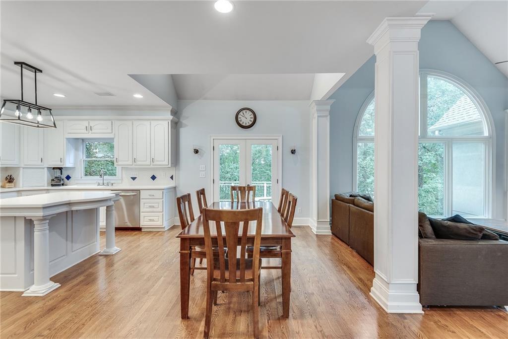 3969 Walkers Ridge Court Dacula, GA 30019 - Photo 20 of 60 a view of a dining room with furniture and wooden floor