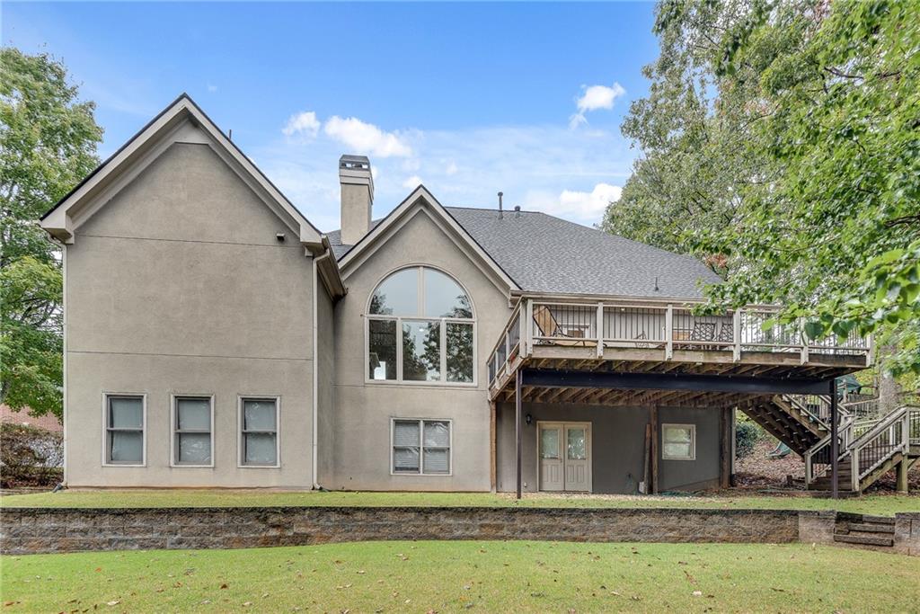 3969 Walkers Ridge Court Dacula, GA 30019 - Photo 2 of 60 a front view of a house with garden