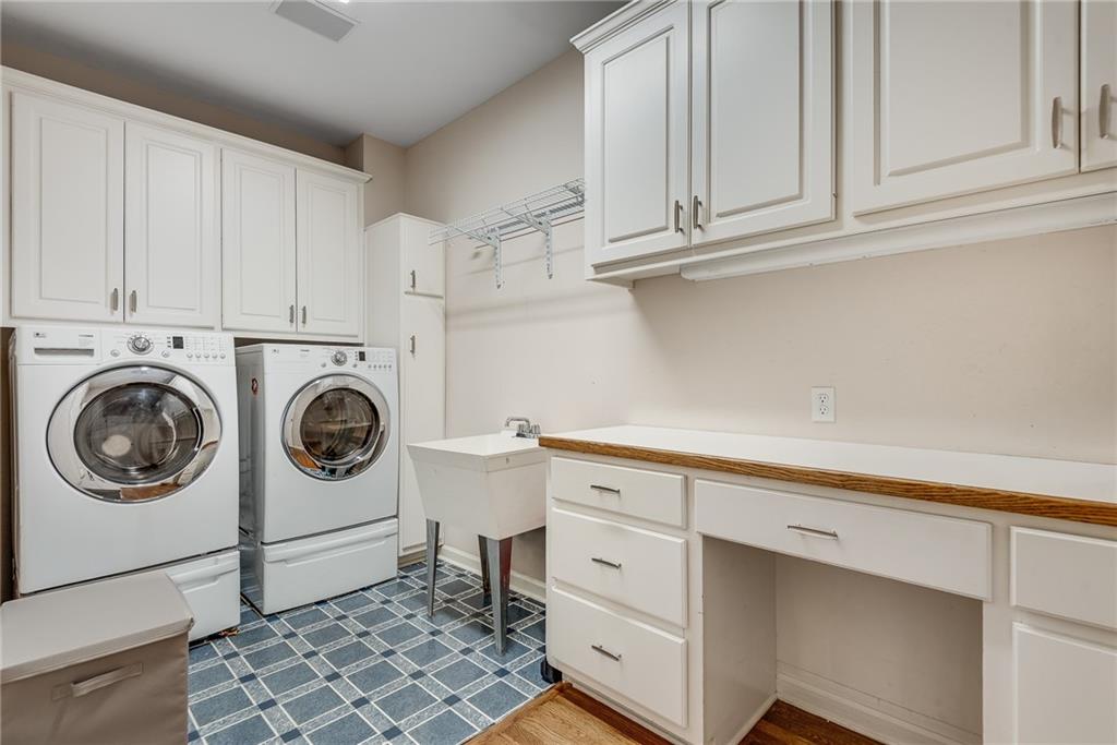3969 Walkers Ridge Court Dacula, GA 30019 - Photo 29 of 60 a utility room with sink dryer and washer