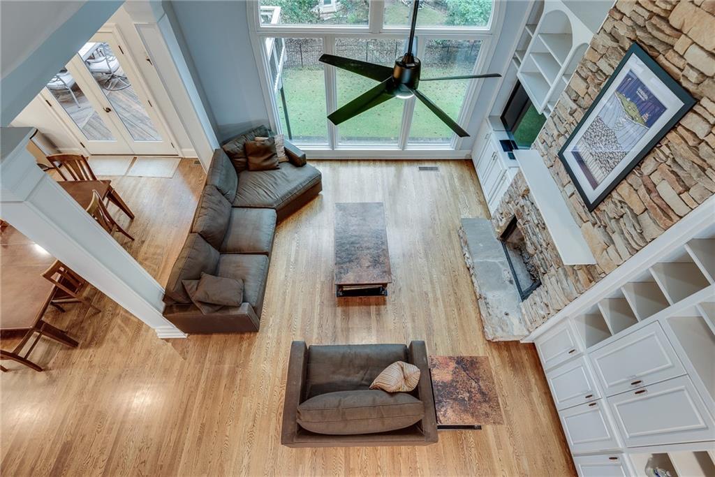 3969 Walkers Ridge Court Dacula, GA 30019 - Photo 43 of 60 a living room with furniture and a wooden floor
