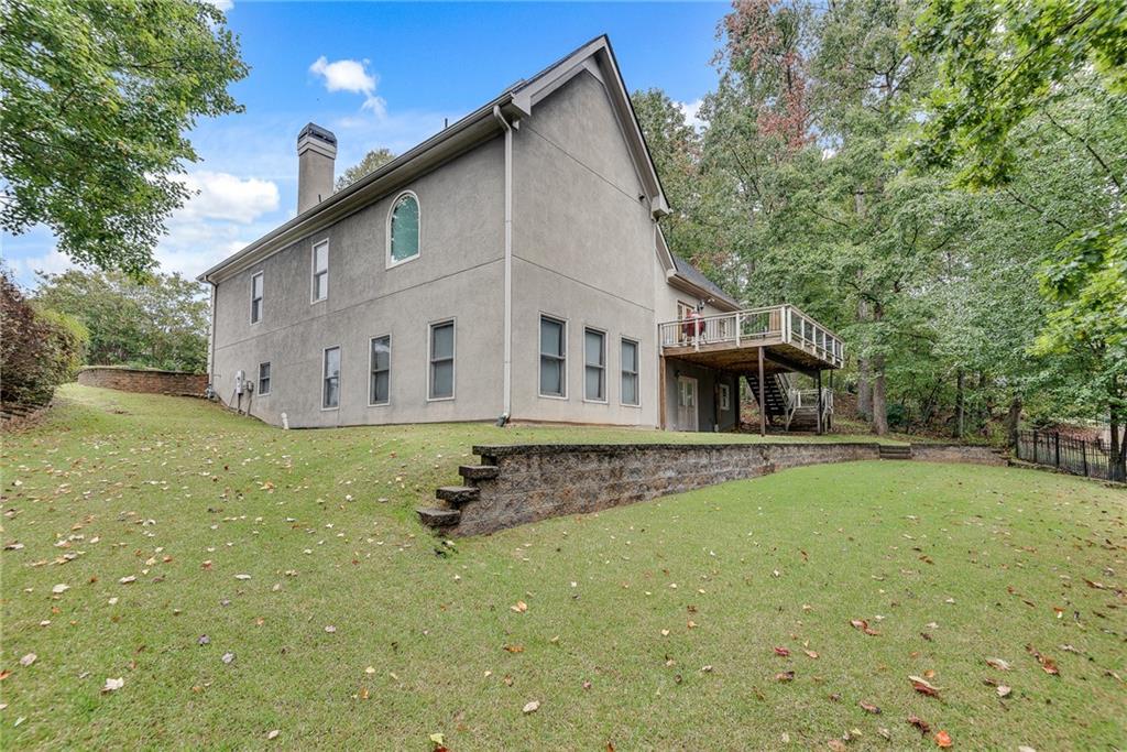3969 Walkers Ridge Court Dacula, GA 30019 - Photo 53 of 60 a view of a house with a yard