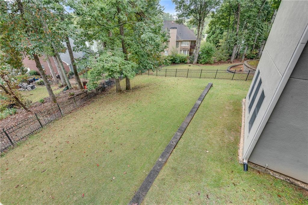 3969 Walkers Ridge Court Dacula, GA 30019 - Photo 56 of 60 a view of a backyard