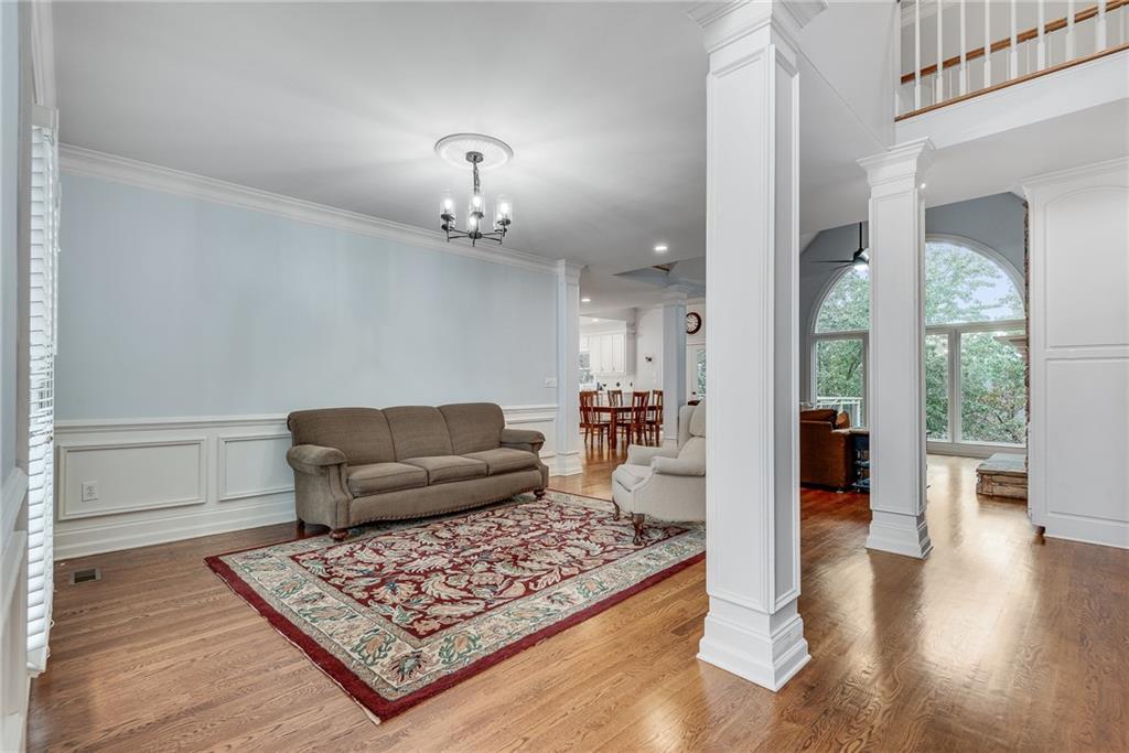 3969 Walkers Ridge Court Dacula, GA 30019 - Photo 10 of 60 a living room with furniture and wooden floor