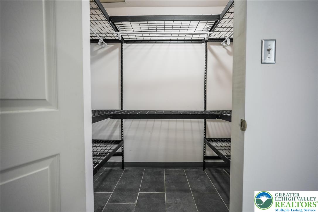 335 Walnut Drive, Unit 1 Northampton, PA 18067 - Photo 12 of 29 a bathroom with a shower and a sink