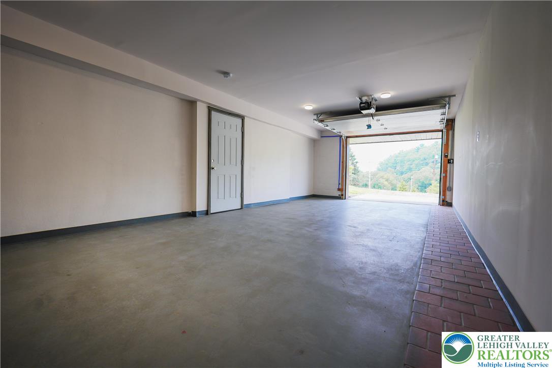 335 Walnut Drive, Unit 1 Northampton, PA 18067 - Photo 16 of 29 a view of an empty room with a window