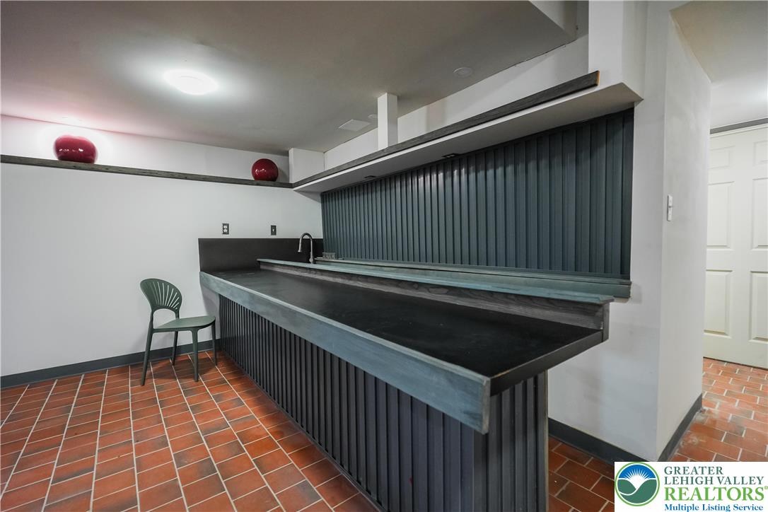 335 Walnut Drive, Unit 1 Northampton, PA 18067 - Photo 20 of 29 a kitchen with sink cabinets and stove