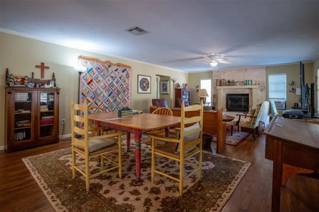 a view of a dining room with furniture