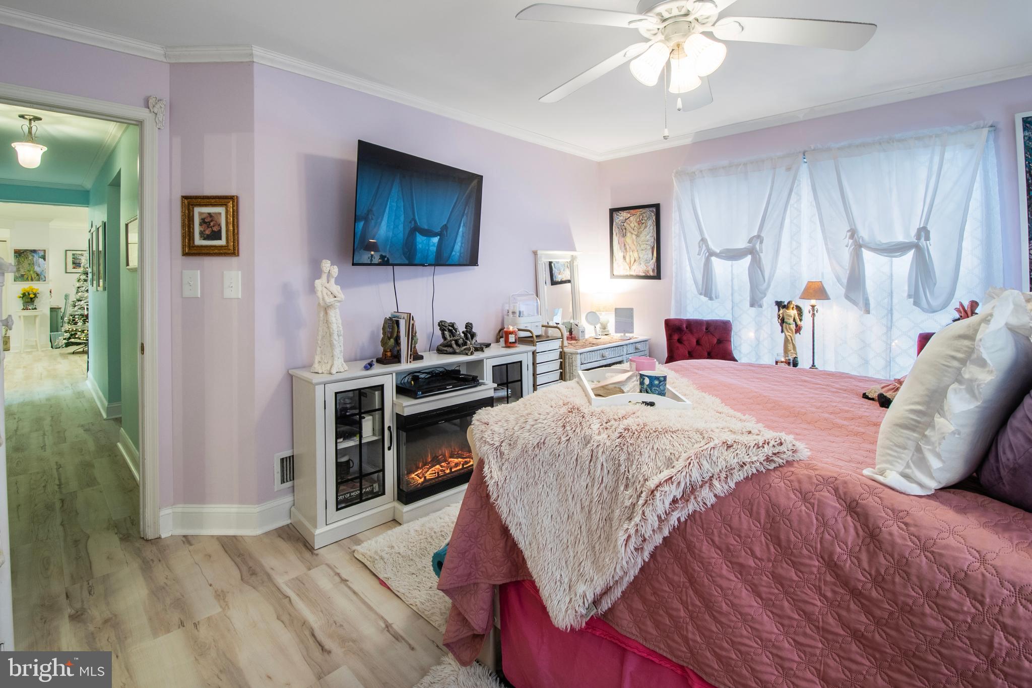 511 Mowat Circle Hamilton, NJ 08690 - Photo 23 of 46 a bedroom with a bed and a flat screen tv