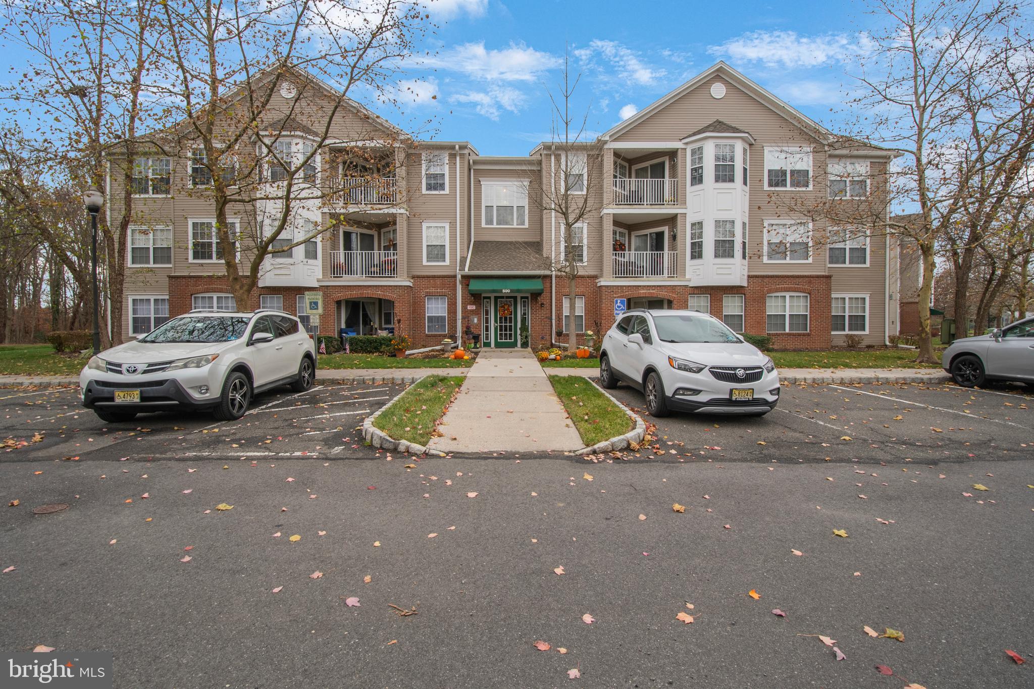 511 Mowat Circle Hamilton, NJ 08690 - Photo 34 of 46 a car parked in front of a building