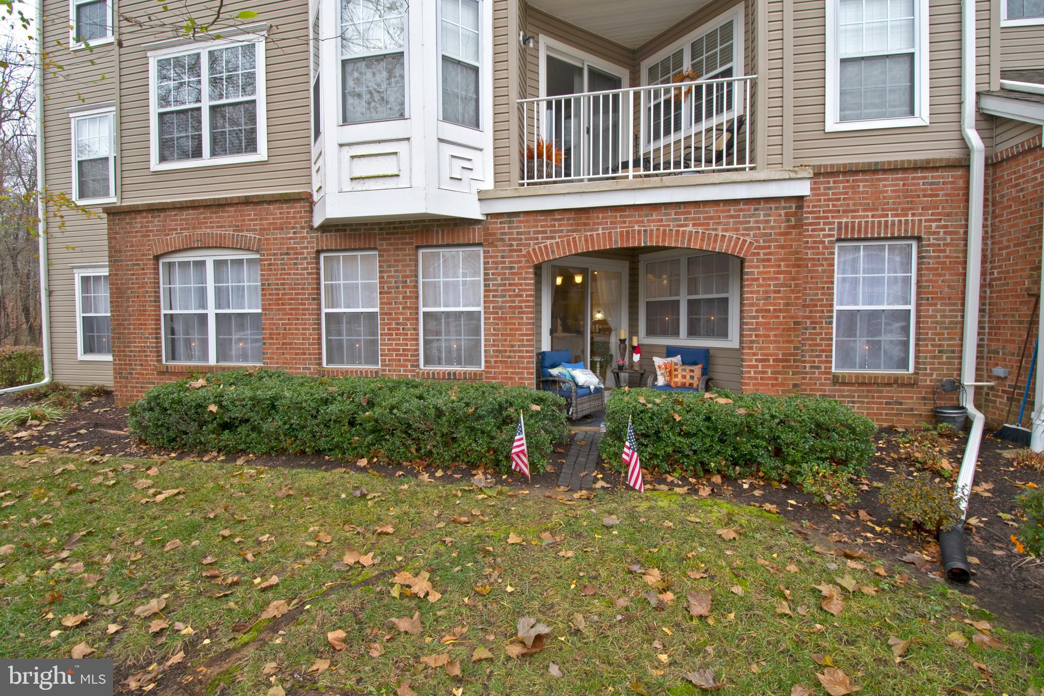 511 Mowat Circle Hamilton, NJ 08690 - Photo 45 of 46 front view of a brick house with a yard