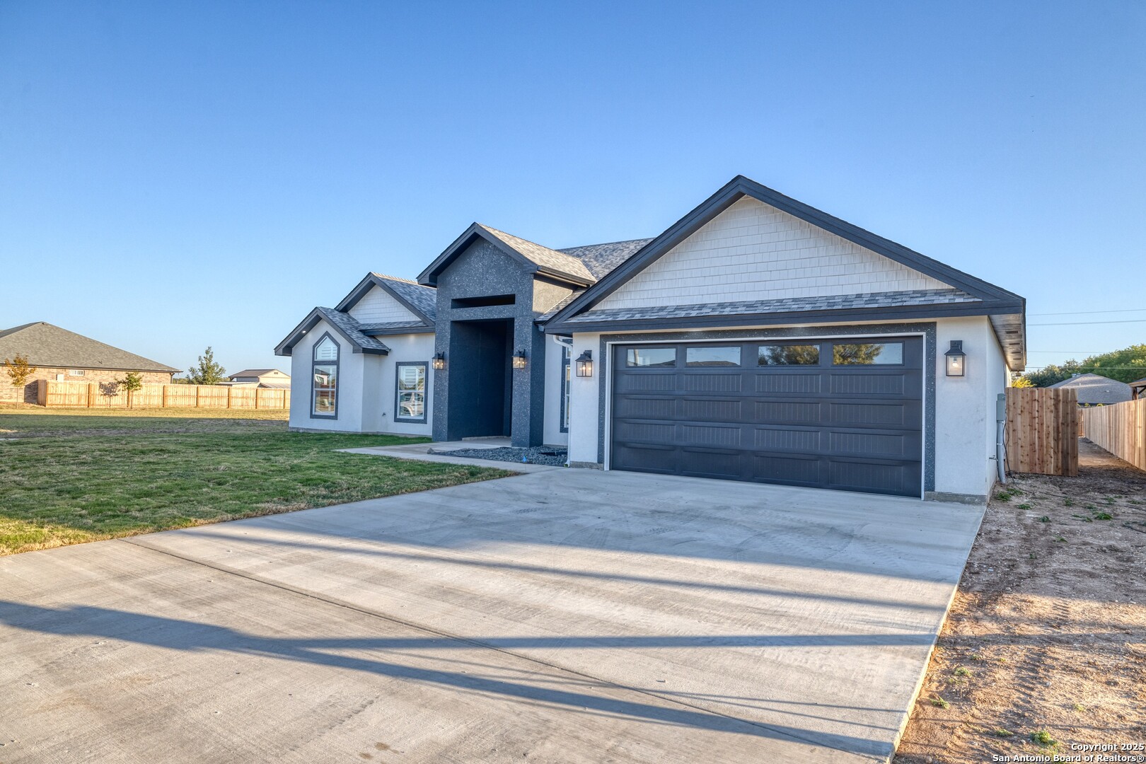 14 Hope Place Uvalde, TX 78801 - Photo 6 of 38 a front view of a house with yard
