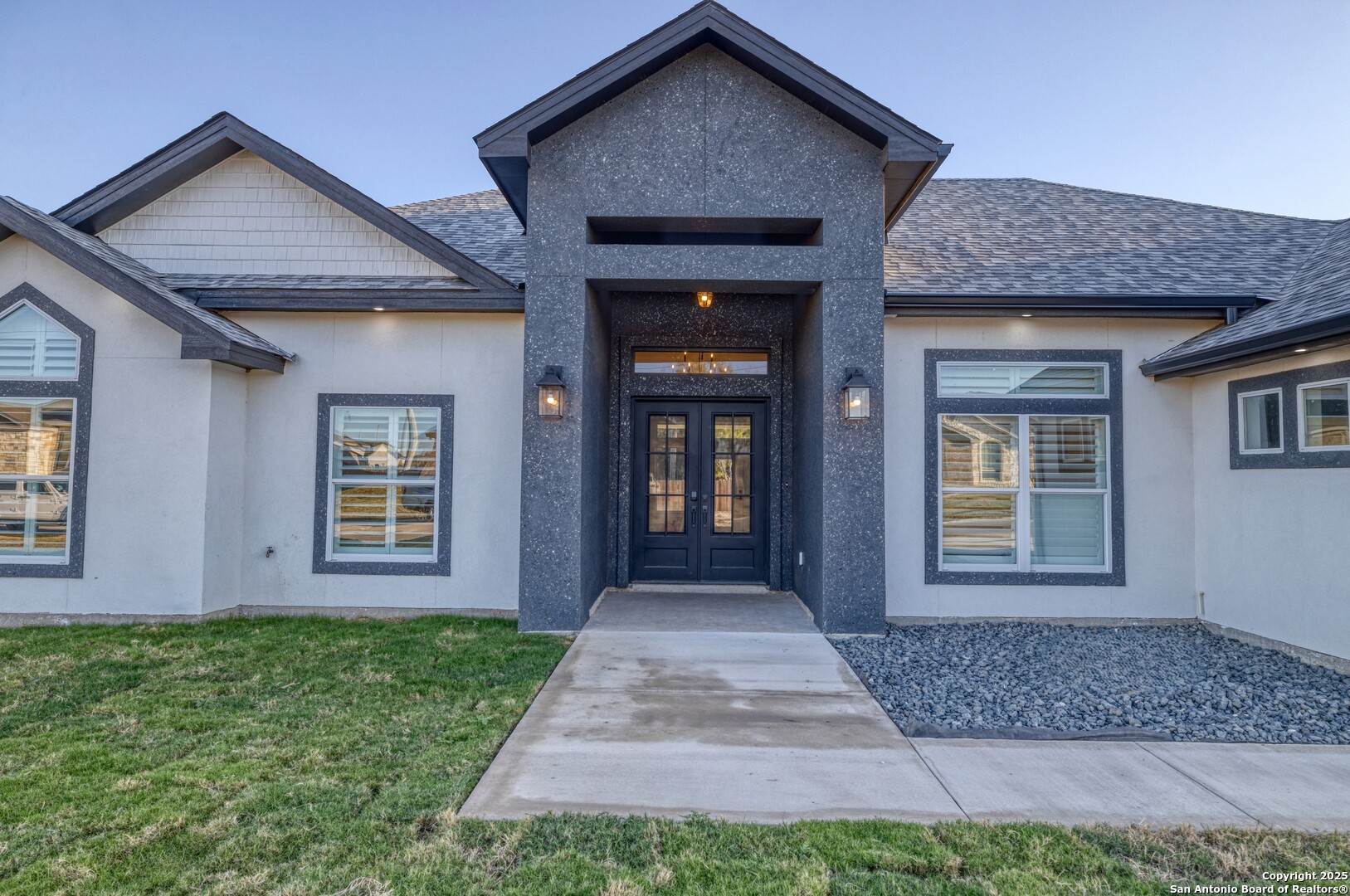 14 Hope Place Uvalde, TX 78801 - Photo 7 of 38 a front view of a house with garden