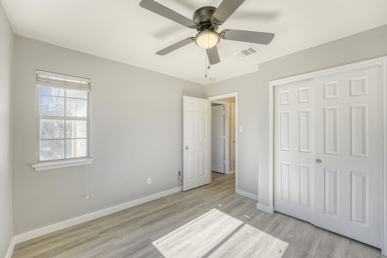 904 Sebastian Bend, Unit B Pflugerville, TX 78660 - Photo 13 of 30 a view of an empty room with a window