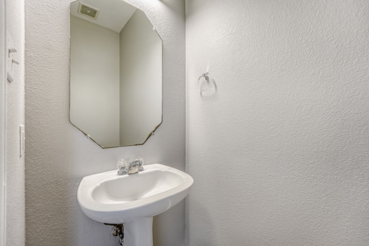 904 Sebastian Bend, Unit B Pflugerville, TX 78660 - Photo 22 of 30 a bathroom with a sink and a mirror
