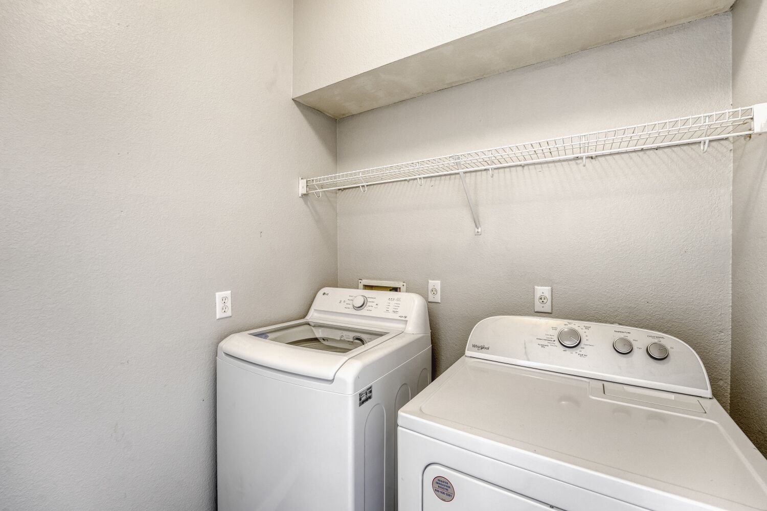904 Sebastian Bend, Unit B Pflugerville, TX 78660 - Photo 23 of 30 a utility room with dryer and washer