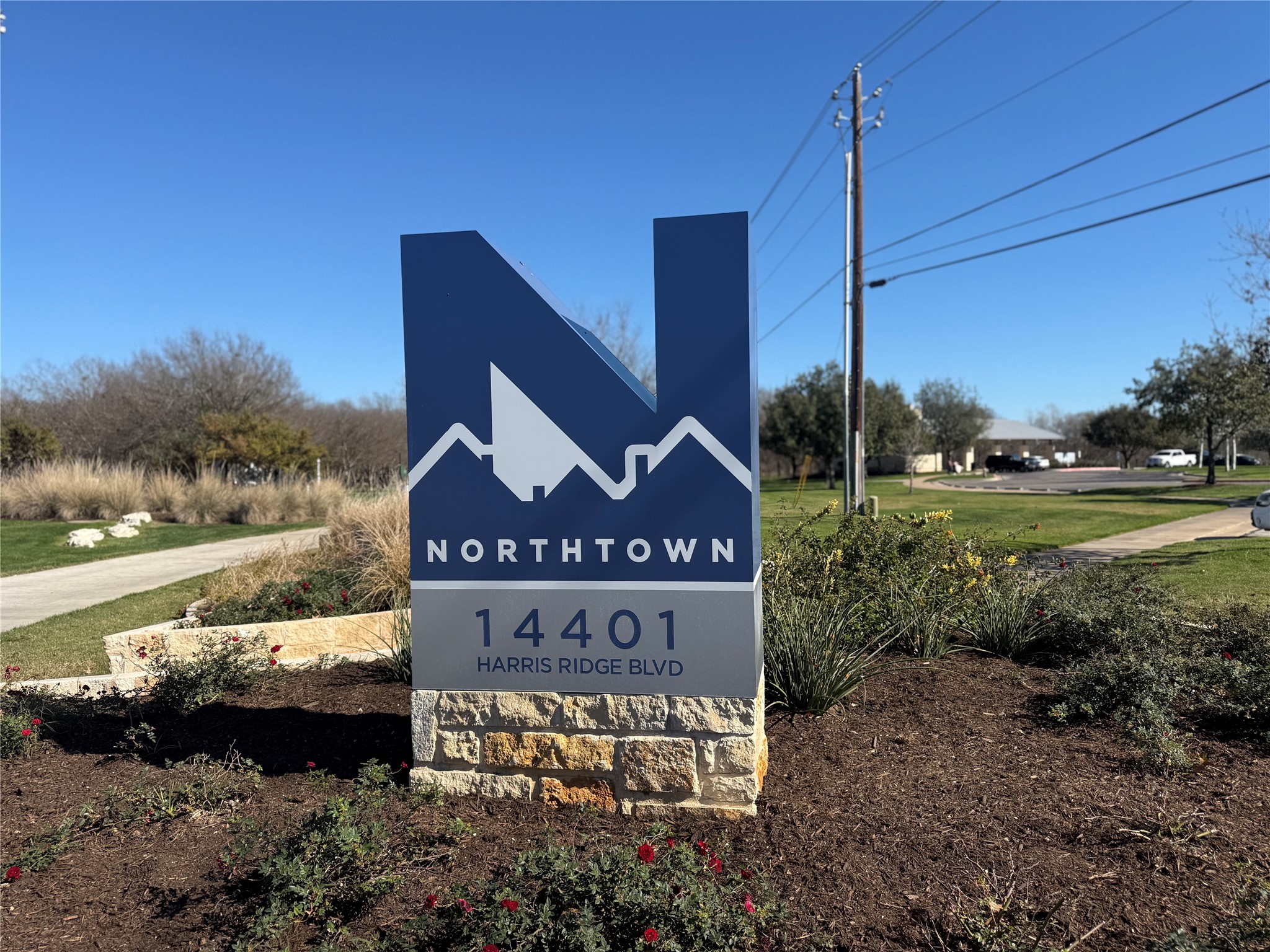904 Sebastian Bend, Unit B Pflugerville, TX 78660 - Photo 27 of 30 a view of a street with a bench in the middle