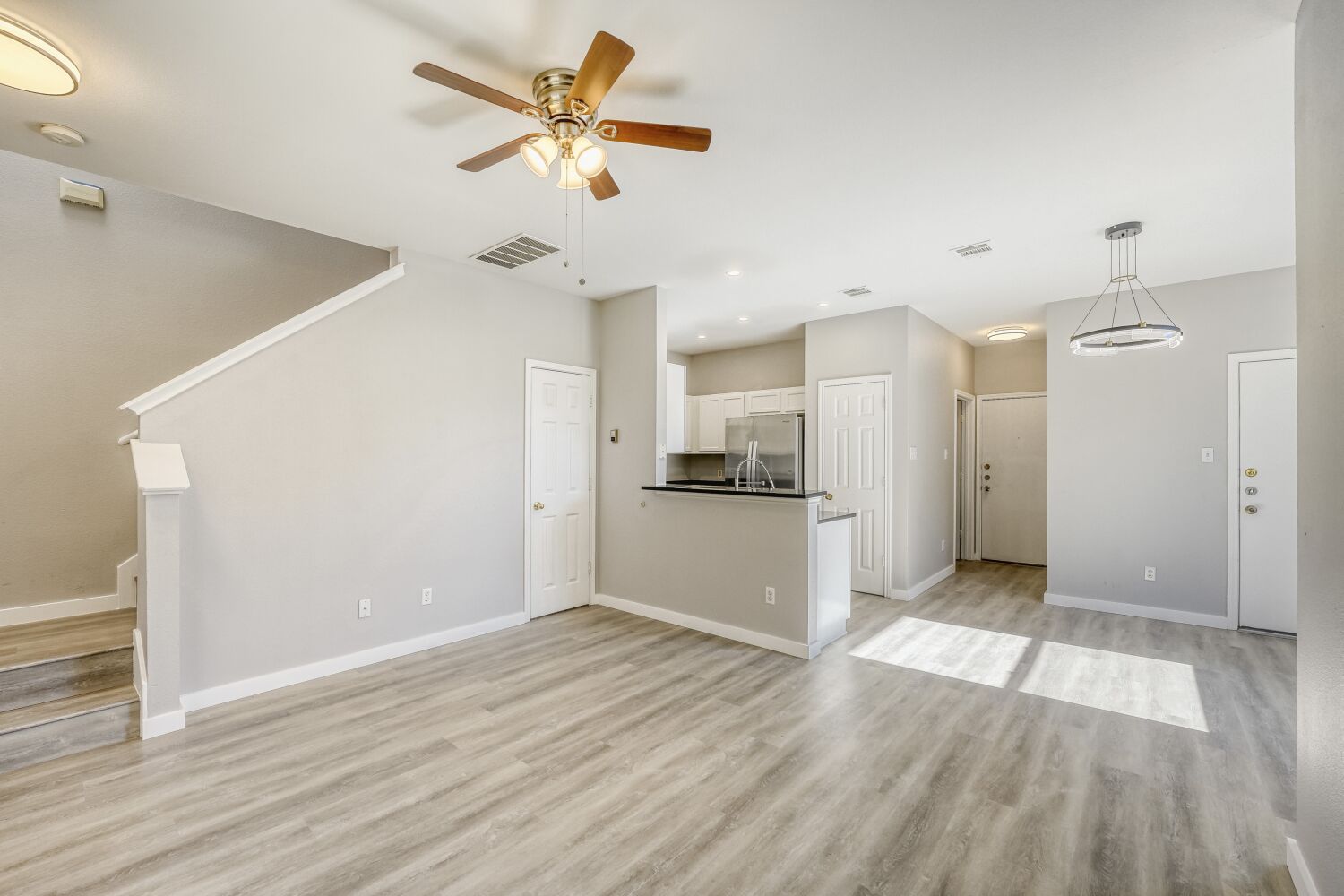 904 Sebastian Bend, Unit B Pflugerville, TX 78660 - Photo 5 of 30 a view of a kitchen with a sink and a refrigerator